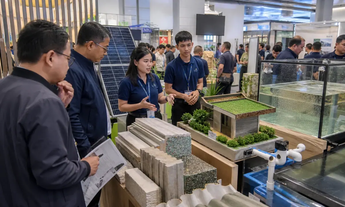 Editorial raster image of a green-technology showcase with resilience exhibits.