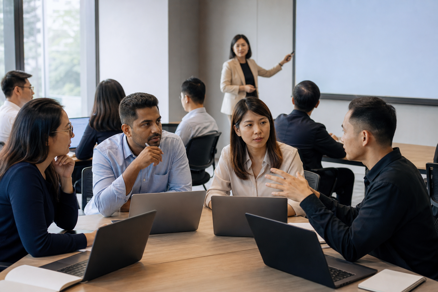 Accountancy and finance professionals take part in a practical AI-learning workshop in Singapore.