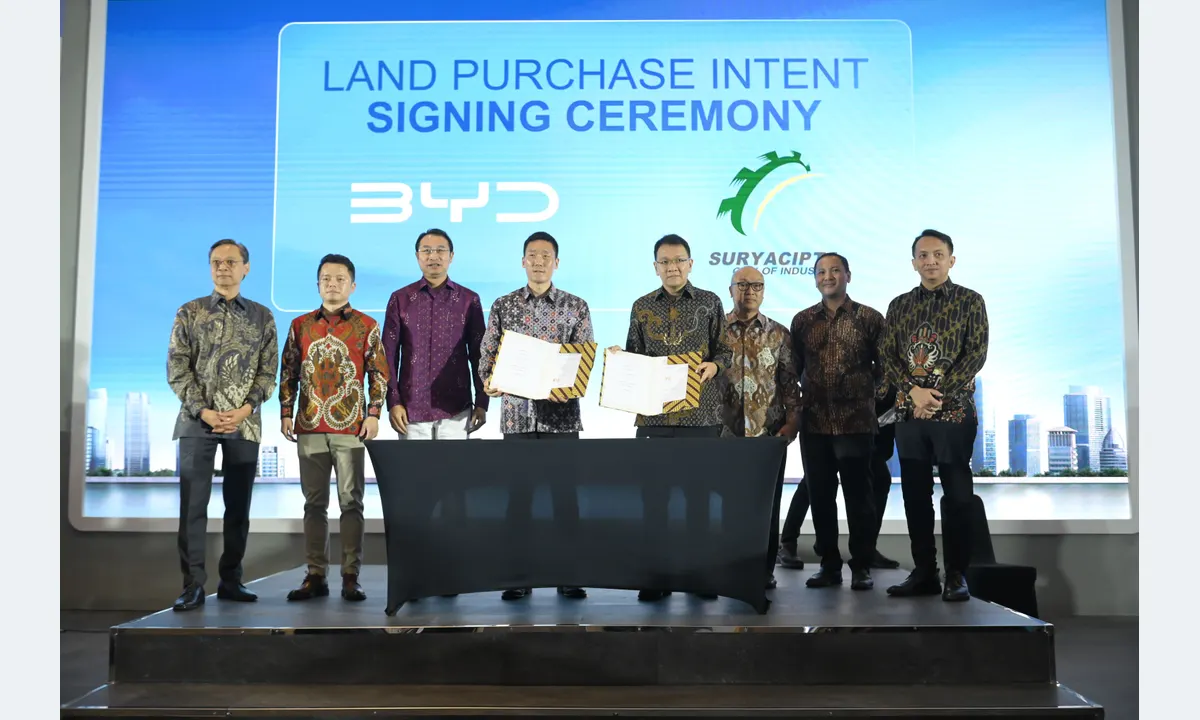 Archive photograph of eight BYD and Suryacipta representatives at the April2024 land-purchase signing.